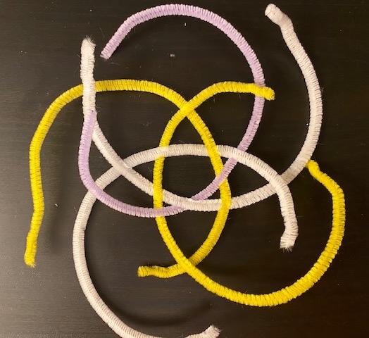 five near circle segments, arranged in a pentagram on the table